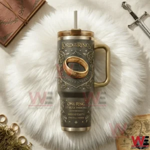 The Lord of the Rings One Ring to Rule them All 40oz Tumbler 5 The Lord of the Rings themed tumbler with handle and straw featuring a raised ring design displayed with fantasy themed decorative items!