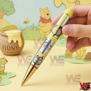 The Pooh 100th Anniversary 1925-2025 Pen 4 Hand holding a The Pooh commemorative pen with honey pot and cartoon themed background celebrating the one hundredth anniversary!