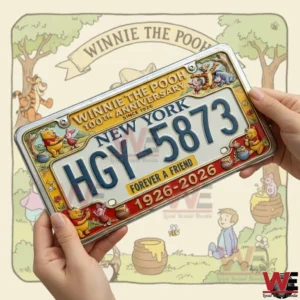 The Pooh 100th Anniversary Car License Plate Frame 5 Two hands holding a New York license plate with a Winnie the Pooh anniversary decorative frame in front of a cartoon themed background!