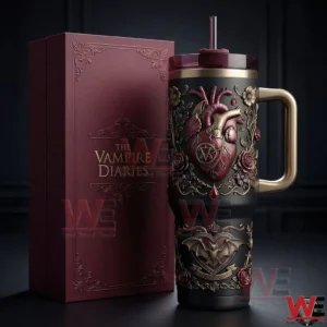 The Vampire Diaries Bat and Heart 40oz Tumbler With Handle 5 Black insulated tumbler with handle and straw next to a matching red box featuring gothic romantic design!