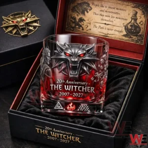 The Witcher twentieth anniversary collector whiskey glass with wolf emblem presented in a deluxe gift box with red accents!