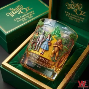 A Wizard of Oz anniversary whisky glass showcased in a green presentation box with embossed artwork and classic story characters!