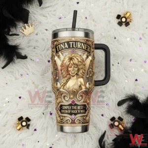 Top view of Tina Turner themed insulated tumbler with gold details placed on a soft decorative background!