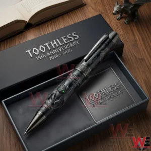 Toothless How To Train Your Dragon 15Th Anniversary Pen 4 Toothless themed collectible pen displayed inside a premium anniversary box on a wooden table!