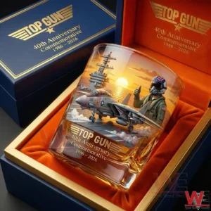 A Top Gun anniversary whiskey glass with aviation artwork displayed inside a premium commemorative box!