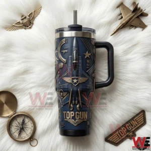 Top Gun tumbler with raised fighter jet artwork displayed on white fur background!