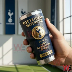 Tottenham Hotspur Stadium Audere Est Facere Home of Spurs Tumbler 3 Hand holding a dark blue Tottenham Hotspur insulated tumbler with anniversary tribute design in a club themed setting!