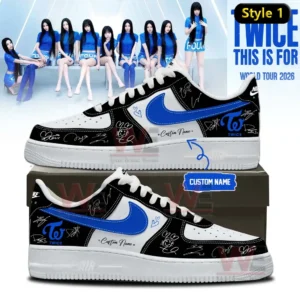 Two custom low top sneakers in white black and blue with blue swoosh Twice logos signature accents heart doodles and custom name detail shown on a shoebox with Twice World Tour 2026 background!