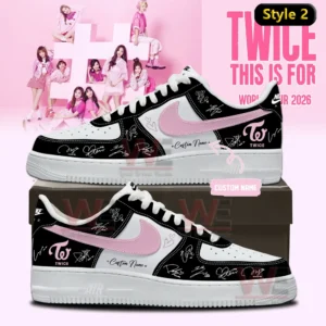Two custom low top sneakers in white black and pink with pink swoosh Twice logos signature accents heart doodles and custom name detail shown on a shoebox with Twice World Tour 2026 background!