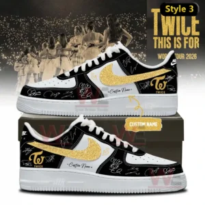 Two custom low top sneakers in white black and gold with glitter swoosh Twice logos signature accents heart doodles and custom name detail displayed on a shoebox with Twice World Tour 2026 concert style background!