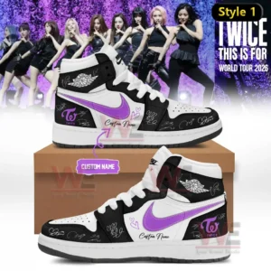 Black and white high top Air Jordan one sneaker with purple swoosh TWICE logo heart doodles signature style markings and custom name shown on a shoebox with world tour 2026 stage background