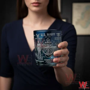 Hand holding a US Navy themed whiskey glass with anchor and naval symbols!