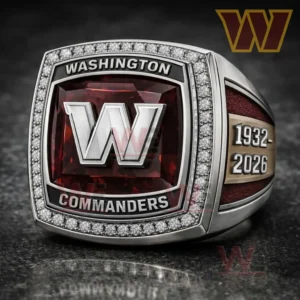 Close up of a Washington Commanders ring with burgundy gemstone top raised W logo Washington Commanders text sparkling border and 1932 2026 anniversary side detail!