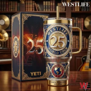 Westlife world tour twenty five years of hits insulated tumbler with ornate gold blue detailing shown next to a matching presentation box on a wooden surface!