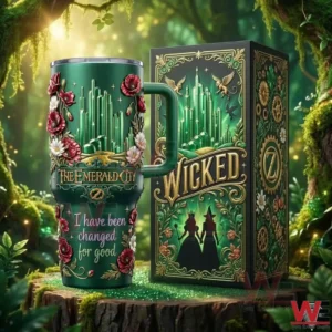 Green fantasy themed handled tumbler with emerald city artwork next to a decorative box in a forest scene!
