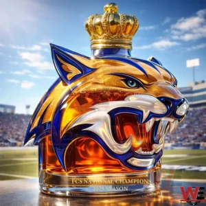 Wildcat head shaped championship bottle with crown cap and blue gold accents displayed on a football field with stadium and crowd in the background!