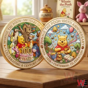 Two Winnie the Pooh one hundredth anniversary coins on a wooden table with colorful character artwork and storybook background decor.