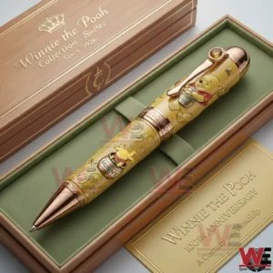 Winnie the Pooh themed anniversary pen in a wooden presentation box with a green interior and polished metallic accents!