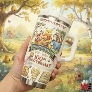 Winnie The Pooh 1926-2026 Commemorative Edition Tumbler 3 Hand holding a white friendship themed metal tumbler with colorful character artwork in a gentle illustrated forest environment!
