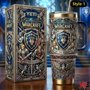 A decorative World Warcraft Alliance tumbler with straw stands next to a matching ornate gift box in blue and gold style!
