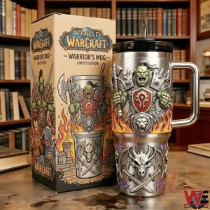 Silver World Warcraft warriors mug tumbler with handle and straw beside a matching limited edition box featuring fantasy warrior artwork on a wooden table!