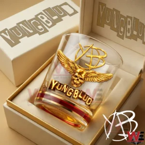 YUNGBLUD I Was Made for Lovin you Gold Glass 10 A Yungblud whiskey glass with gold skull wing design is placed neatly inside a presentation box highlighting premium packaging and design!