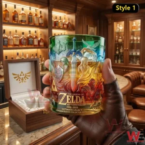 Hand holding a Zelda anniversary whiskey glass with detailed fantasy artwork inside a classic wooden bar!