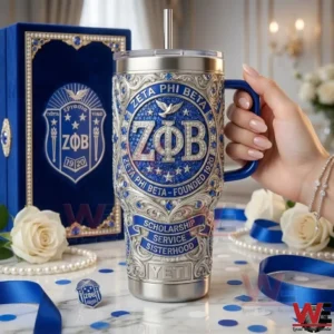 Metal tumbler with blue and silver decorative design displayed with a matching luxury gift box in an elegant indoor setting!