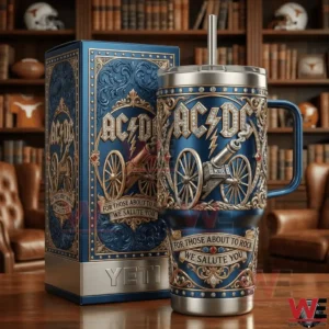 Blue ACDC cannon tumbler with ornate design next to matching box on wooden table!