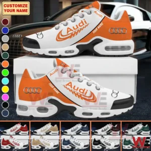 White and orange Audi themed sneaker with customizable name and sporty sole design.