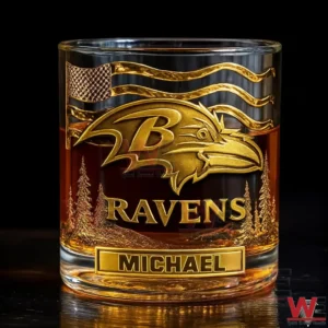 Gold Baltimore Ravens whiskey glass with engraved logo and the name Michael!