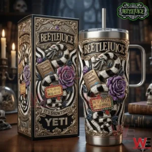 Beetlejuice themed insulated tumbler with detailed gothic artwork displayed next to its box on a dark table!