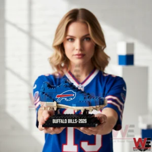 A person holding a blue Buffalo Bills building block football shoe display!