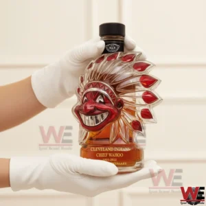 Cleveland Indians Chief Wahoo anniversary whiskey bottle held with white gloves!