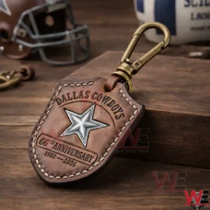 Leather Dallas Cowboys star keychain on wooden surface!