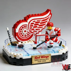 A Red Wings themed building set with a hockey player and wing logo on an ice rink base!
