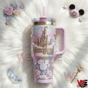 Pastel disneyland magic tumbler with handle and straw decorated with castle and floral details!