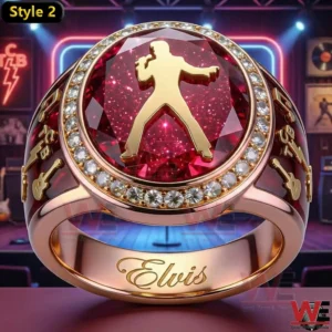 Gold ring with red gemstone and Elvis performance silhouette.
