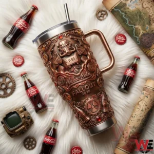 A Fallout Nuka Cola themed metal tumbler surrounded by retro game accessories!
