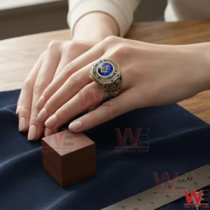 Blue and gold Freemasonry ring with square and compass symbol on a hand!