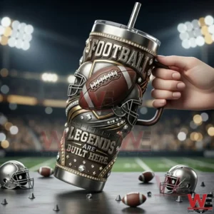 Game Night Football Legends Are Built Here Tumbler 5 Hand holding a football themed tumbler in a stadium setting!