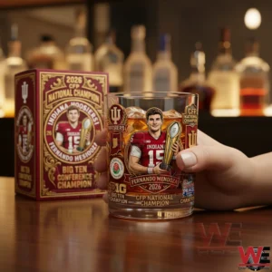 Hand holding Indiana Hoosiers championship whiskey glass in bar setting!