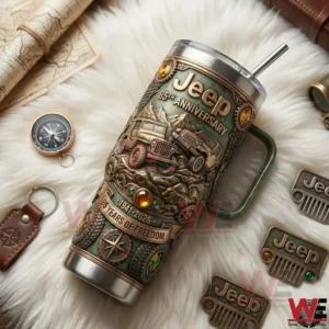 Jeep 85th Annviersary Go Anywhere Do Anything 40oz Tumbler With Handle 3 Jeep anniversary tumbler displayed with travel accessories on soft background!