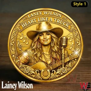 Gold commemorative coin showing Lainey Wilson with guitar microphone and country style design!