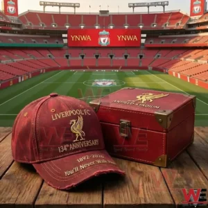 Liverpool FC anniversary cap and red keepsake box displayed at Anfield Stadium!
