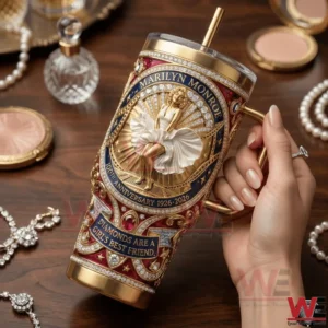 Hand holding a luxury Marilyn Monroe centennial tumbler in a vanity setting with pearls!