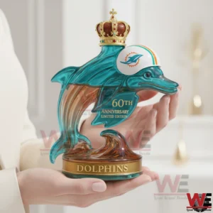 Dolphin shaped Dolphins anniversary whiskey bottle held in hands!
