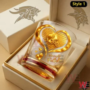 A Minnesota Vikings themed whiskey glass with a golden heart design inside a gift box!