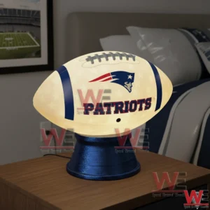 Glowing New England Patriots football night light on a bedside table!