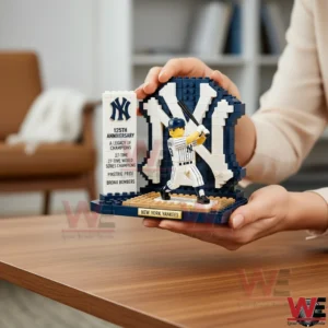 New York Yankees 125th Anniversary Brick Edition 3 Hands holding a brick New York Yankees baseball player model with team logo backdrop indoors!